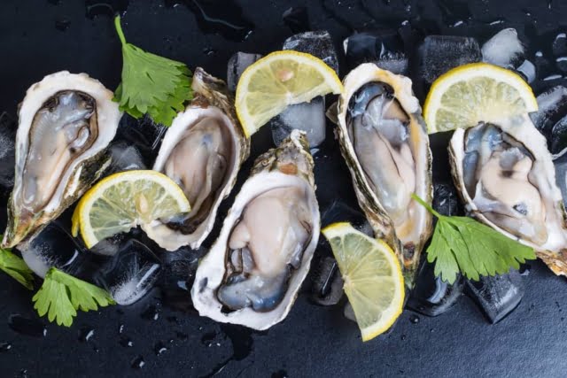 10 Foods to Cure Erectile Dysfunction Permanently 2 oysters black background